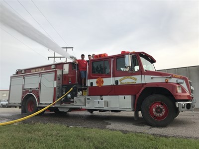 New members learning pump operations on Engine 2